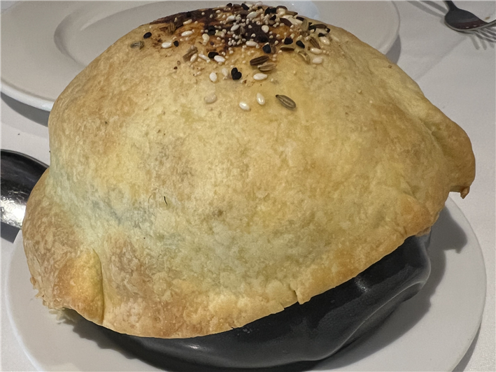 lamb biryani with its pastry lid